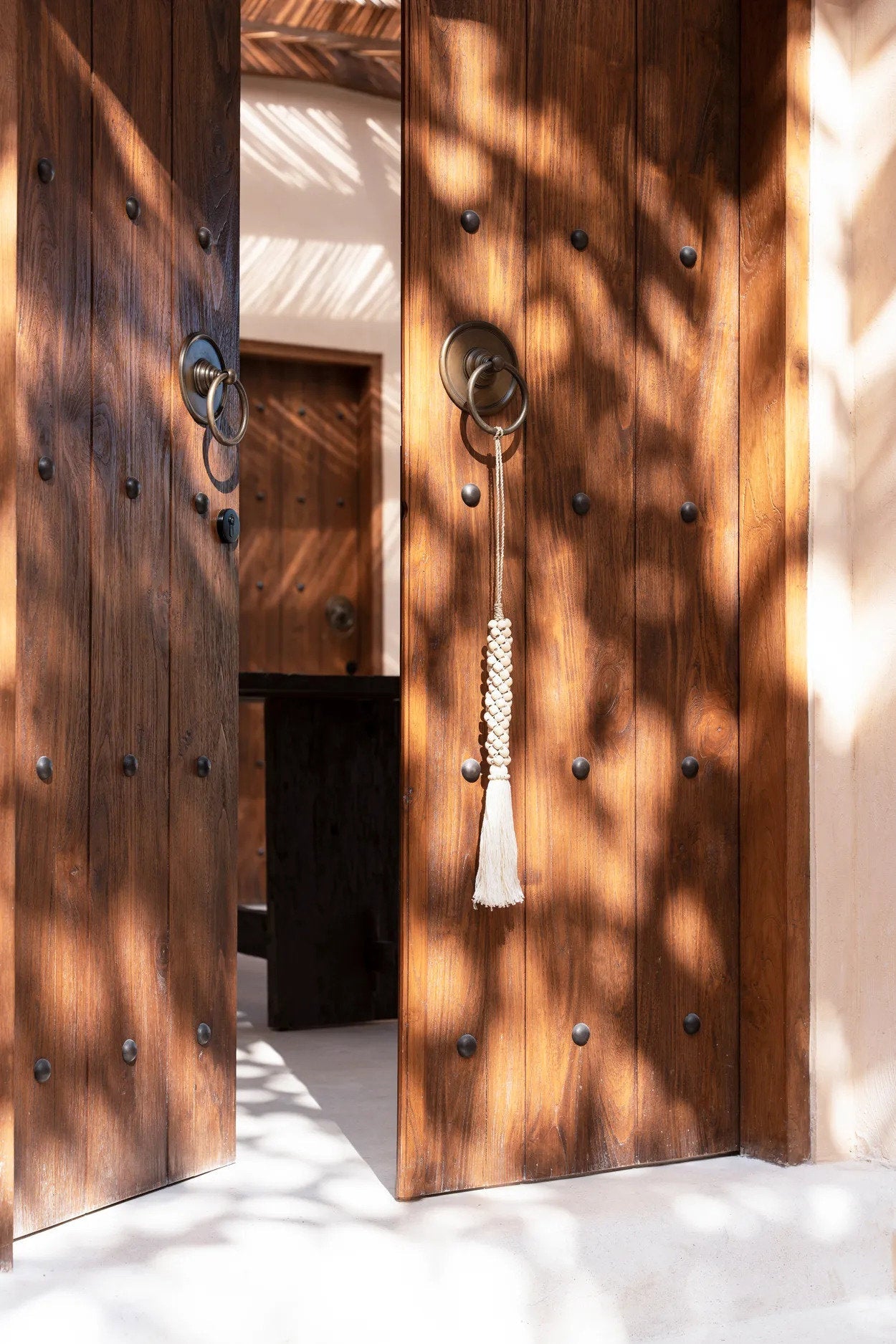 Les perles en bois avec pompon en coton - Blanc naturel