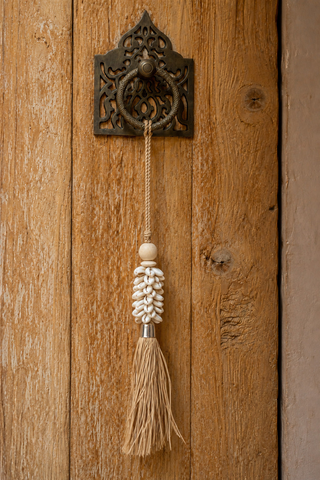 The Cowrie and Raffia Hanging Decoration