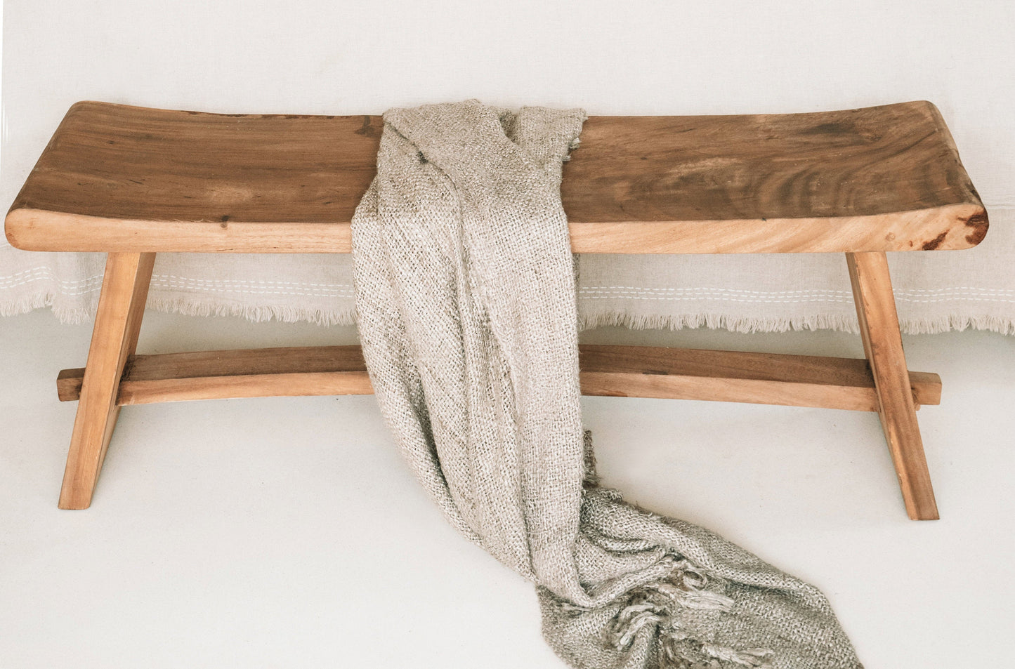 "The s'il vous Plaid - Beige" translates to "The 'if you please' Plaid - Beige"