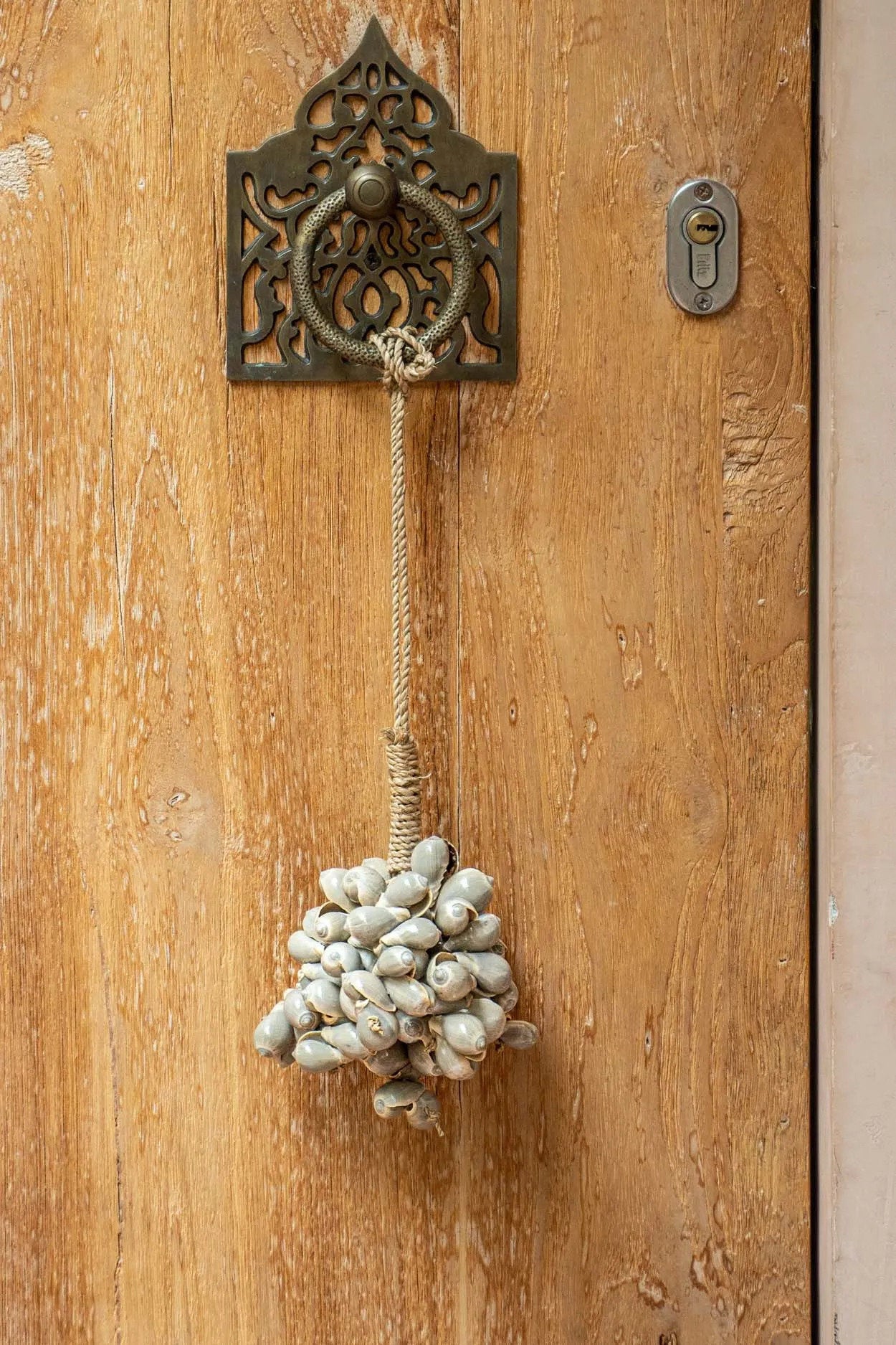 "The Grey Shell Tassel"
