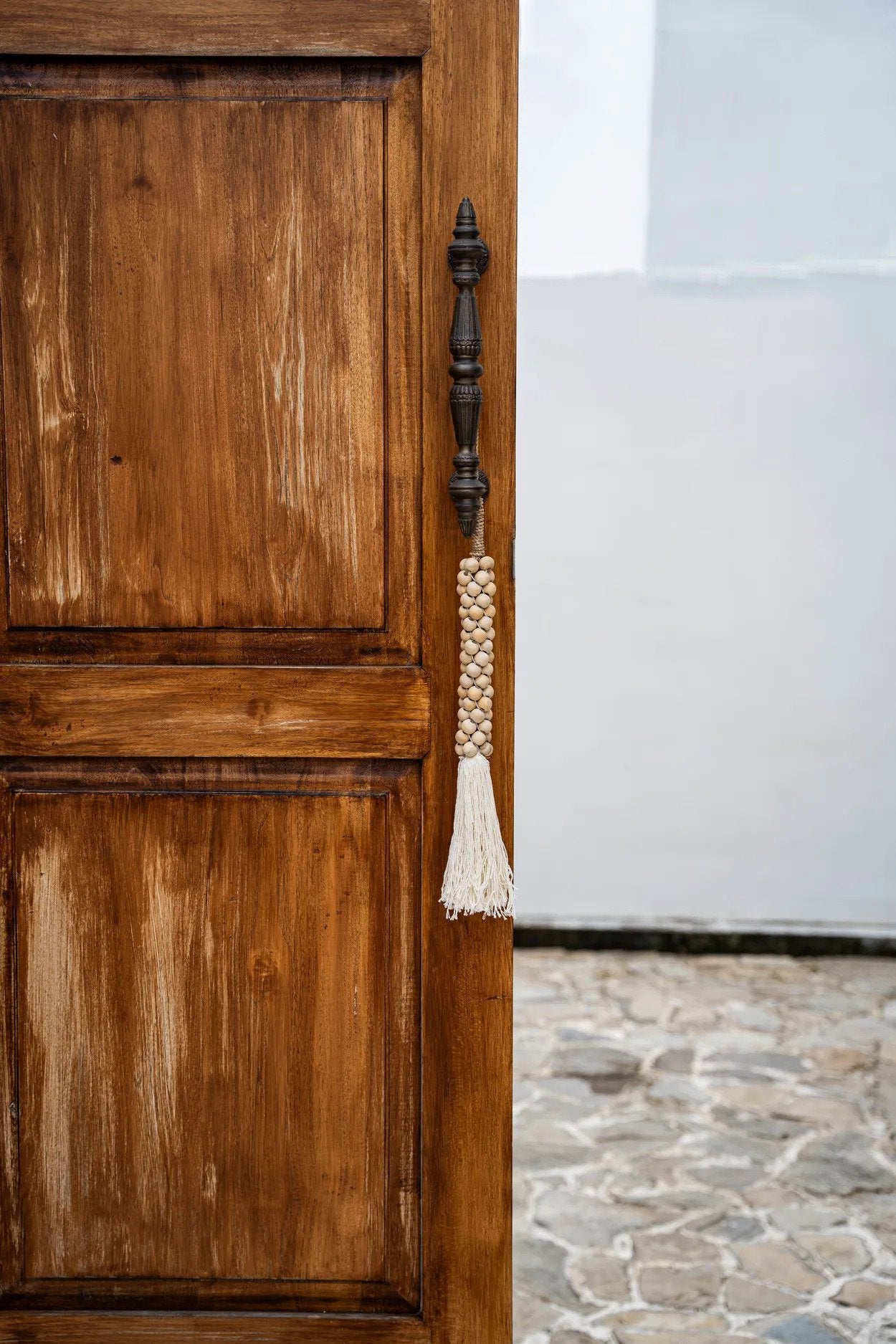 Les perles en bois avec pompon en coton - Blanc naturel
