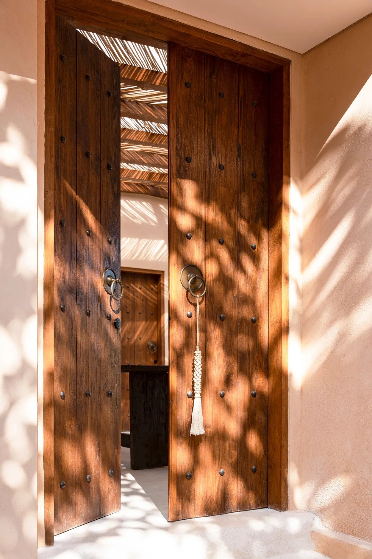Les perles en bois avec pompon en coton - Blanc naturel