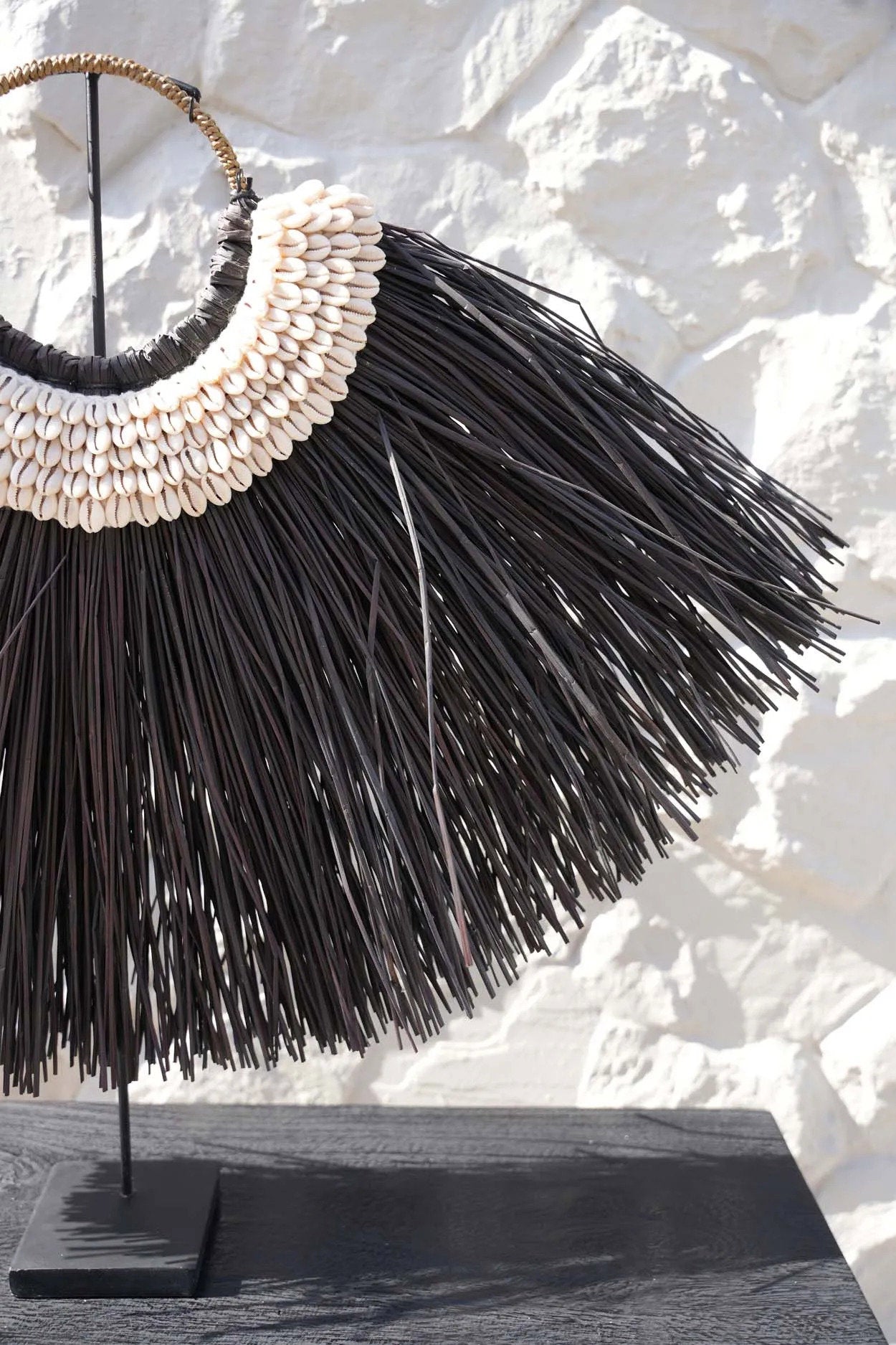 The Alang Cowrie on Stand