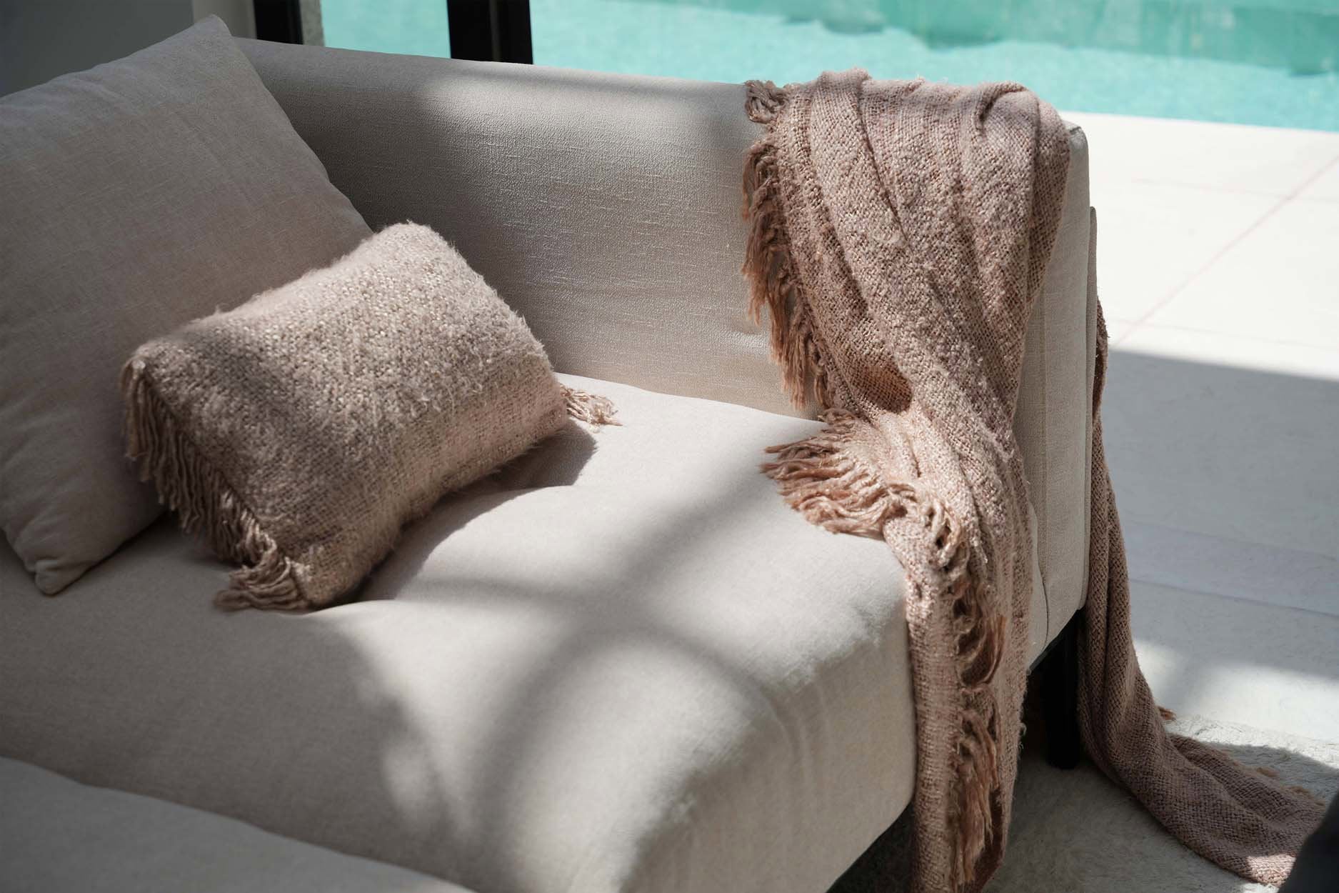 "The s'il vous Plaid - Beige" translates to "The 'if you please' Plaid - Beige"