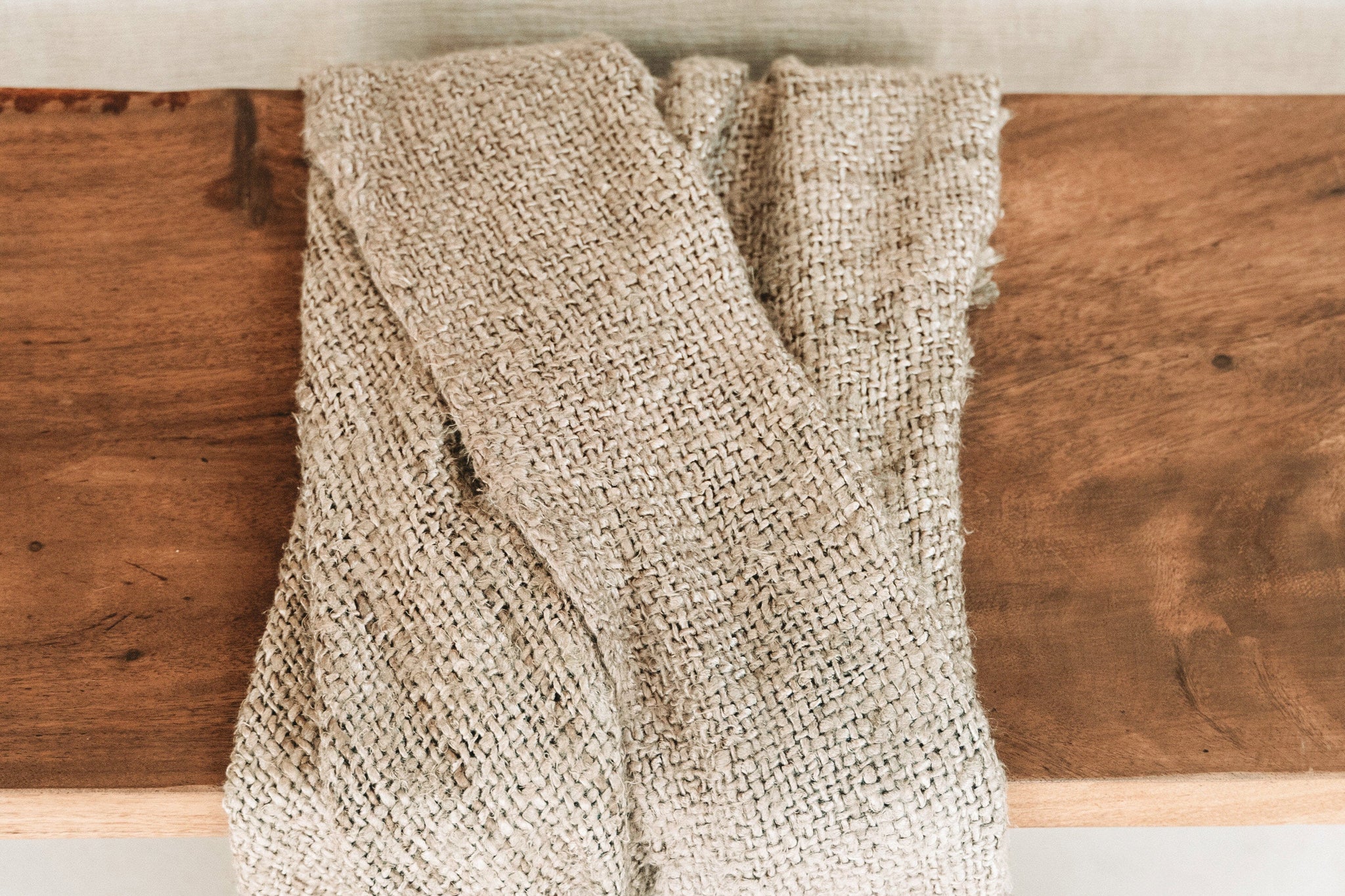 "The s'il vous Plaid - Beige" translates to "The 'if you please' Plaid - Beige"