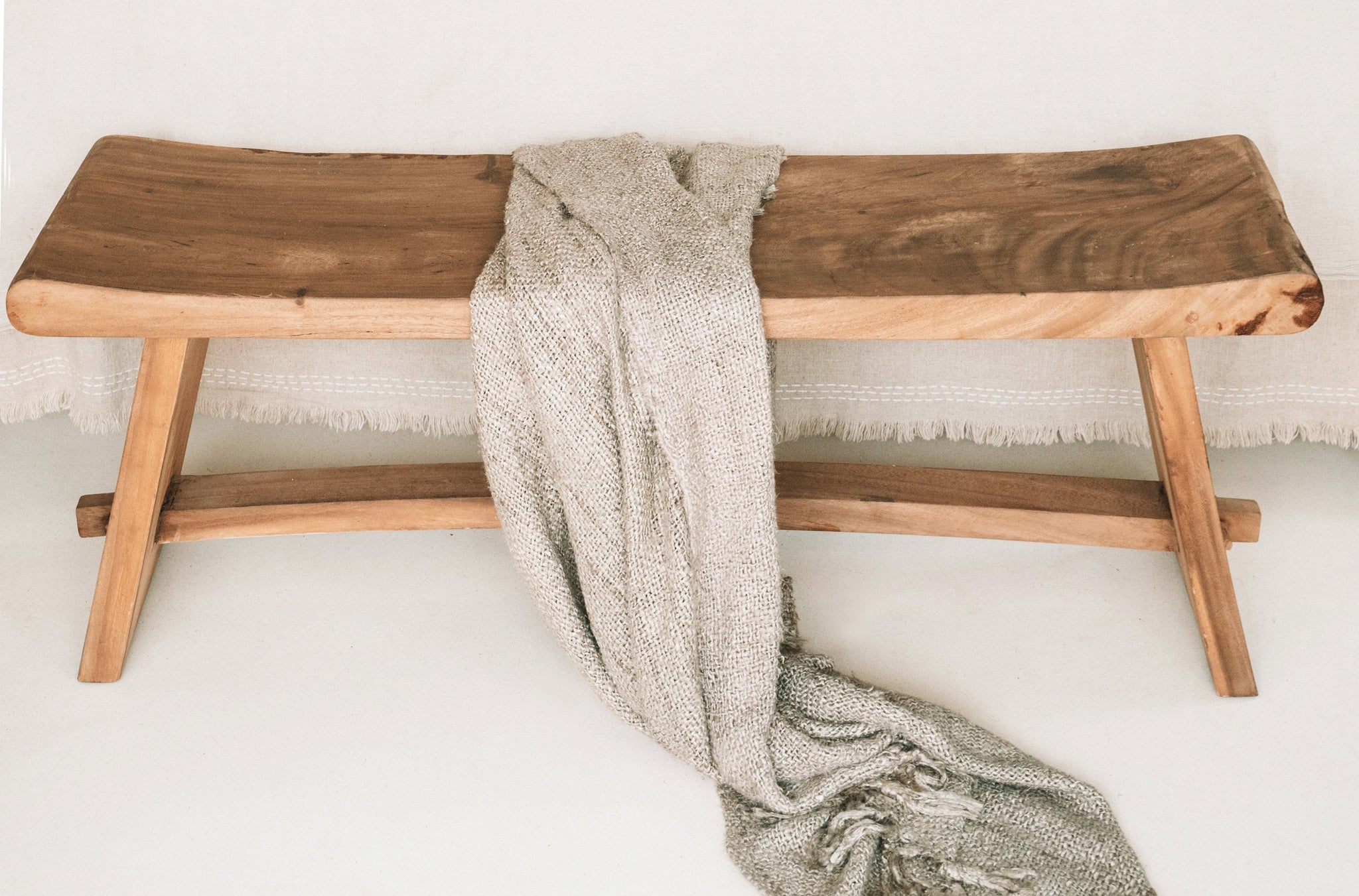 "The s'il vous Plaid - Beige" translates to "The 'if you please' Plaid - Beige"